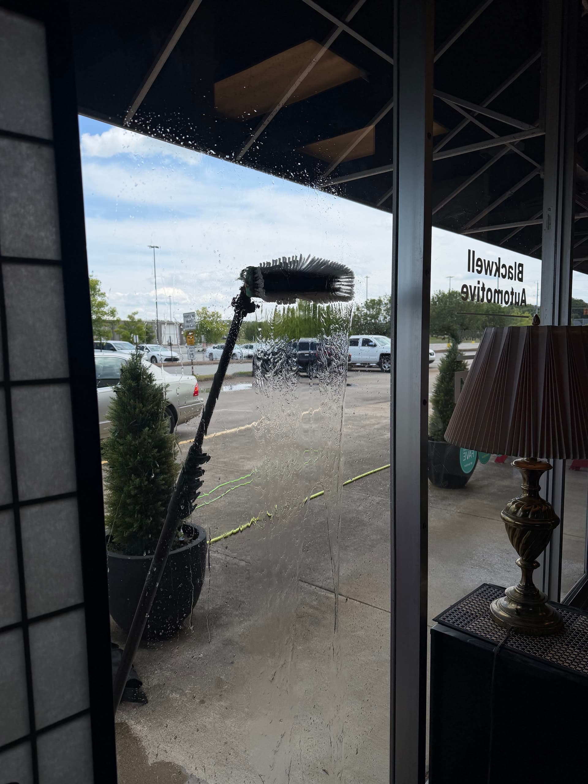 Exterior Window Cleaning for a Local Auto Shop image